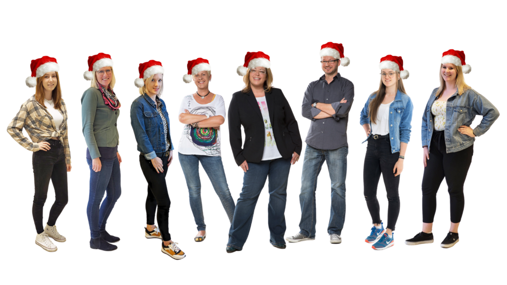 Das crosseye Team mit Weihnachtsmützen. Das crosseye Team mit Weihnachtsmützen.