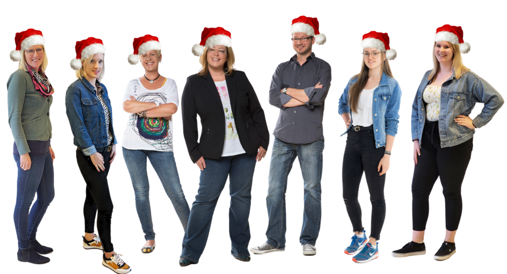 Das crosseye Team mit Weihnachtsmützen. Das crosseye Team mit Weihnachtsmützen.